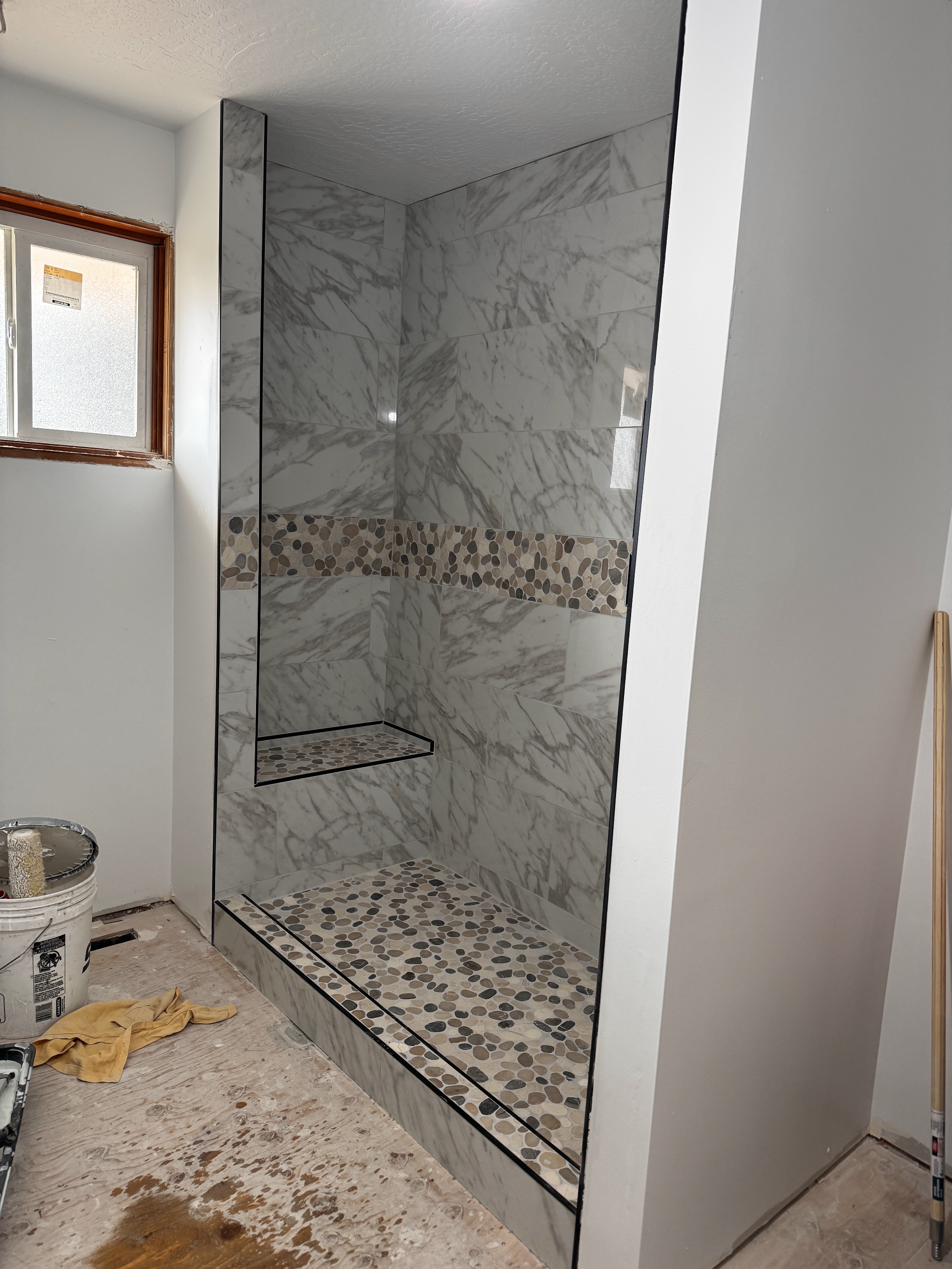 Accessible shower with grab bars